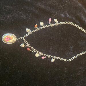 22" silver tone necklace with vintage pendant.